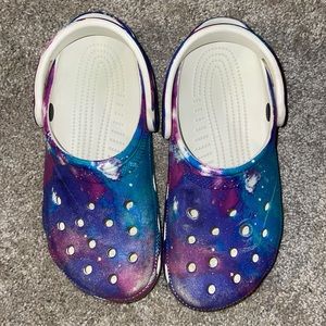 CROCS; super popular~color:galaxy (purple, teal, and fuchsia)~size 7(W) 5(M)